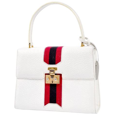 portaciuccio gucci|white Gucci handbag.